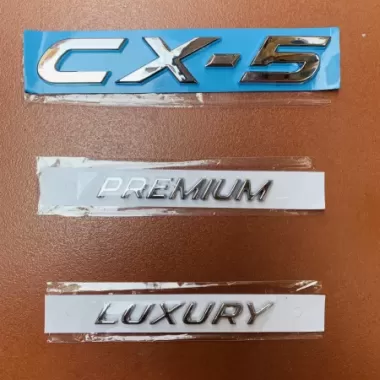 Logo chữ nổi PREMIUM / LUXURY / CX-5 dán xe KIA Cerato, K3, Soluto....: Mazda 3, Mazda 6, CX5, CX8.