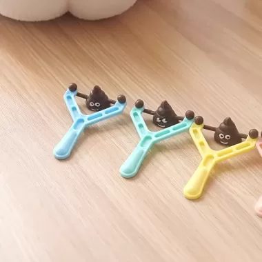 NÁ NHỰA BẮN SHIT GIẢM STRESS VUI NHỘN