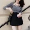 NITTY Váy ngắn nữ váy đen váy chữ A cạp cao phong cách Hàn Quốc 1