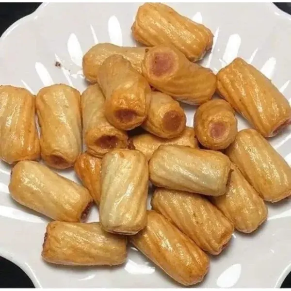 Hình ảnh sản phẩm Chả mực xoắn Trung chiên giòn thả lẩu đồ ăn vặt siêu ngon giá 49.500đ