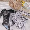 Đồ Bơi Một Mảnh Tay Dài Cao Cấp Giá Rẻ Chỉ 189k - Giảm 234360 VND 8