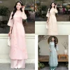 Bộ áo dài cổ tàu thêu hoa nút tàu lớn tay loa, quần dài ống rộng, nữ tính - chỉ 50.000