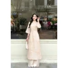 Bộ áo dài cổ tàu thêu hoa nút tàu lớn tay loa, quần dài ống rộng, nữ tính - chỉ 50.000 6