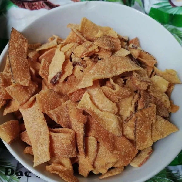 Khám phá quy trình sấy khô truyền thống của mứt dừa sấy giòn Mạnh Trường – đặc sản Bến Tre