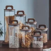 Hũ Thuỷ Tinh Nắp Kín Có Tay Cầm, Lọ Thuỷ Tinh Nắp Gỗ Borosilicate Chịu Nhiệt, Không Chứa Chì Cao Cấp