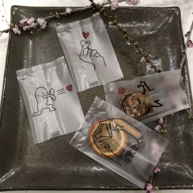 Set 100 túi 5.5x8.5 cm họa tiết vui nhộn túi hàn miệng đựng trà bánh kẹo giá 16.500