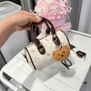 Túi xách HelloKitty size 20 giảm 50% - Cầm tay Someris tặng charm xinh, giá chỉ 83788đ 11