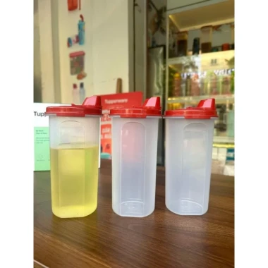 TUPPERWARE Bình đựng dầu/ nước mắm Stor N Pour. 6 TUPPERWARE Bình đựng dầu/ nước mắm Stor N Pour. 6