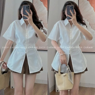 Áo sơ mi nữ cổ đức tay ngắn chiết eo xòe nhẹ, dây buộc sau lưng - Giá 105.000₫ 2 Áo sơ mi nữ cổ đức tay ngắn chiết eo xòe nhẹ, dây buộc sau lưng - Giá 105.000₫ 2
