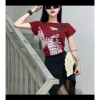 Áo thun croptop nữ COCAHOUSE in 68 loang không bong, nút kim loại khoét - Cá tính 99.999₫ 4