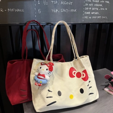 Túi vải in hình hellokitty dễ thương Nhật Bản Thời trang nữ phong cách giản dị đi làm hàng ngày Túi đeo vai dung tích lớn Túi vải in hình hellokitty dễ thương Nhật Bản Thời trang nữ phong cách giản dị đi làm hàng ngày Túi đeo vai dung tích lớn