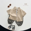 Aó sơ mi ngắn tay kaki mềm form rộng, mix đồ cá tính cho bé trai mùa hè S9 9