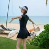 Bộ đồ bơi nữ đi biển hồng phấn phối đen - váy xòe, áo tay ngắn in chữ, giảm giá 199k 3