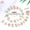 Mặt dây chuyền vàng nhân vật may mắn họa tiết hoa - Giá chỉ 20.634 VND, giảm mạnh