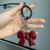 Móc khóa điện thoại đa năng Nơ trái tim đỏ - Phụ kiện thời trang Bapa - Quà tặng mới 10