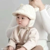 Mũ lông tai gấu bịt tai giữ ấm mùa đông cho bé 2-5 tuổi - Giá 75.800 VND