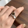 Nhẫn mắt đá nâu 2 lớp Zircon, vòng thép không gỉ, mở thanh lịch, giá 50.600₫ 9