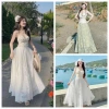 Sét váy nữ nhẹ nhàng đi biển - áo hoa cam 2 dây cánh, cúp ngực, váy dài - 190k