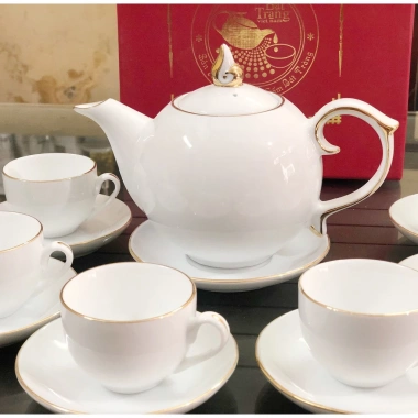 Ấm chén trắng viền vàng, bát tráng cao cấp – Quà tặng sang trọng, giá 220.000₫ 2