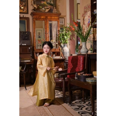 Áo dài bé gái Cát Tường màu vàng Thu Hà Silk Tết 2.026, giá chỉ 295.000₫