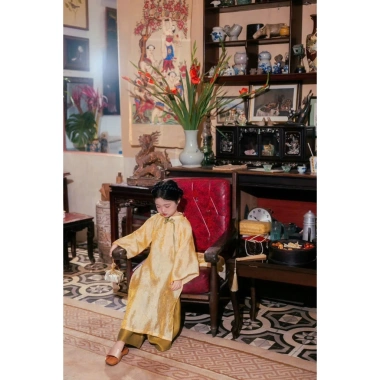 Áo dài bé gái Cát Tường màu vàng Thu Hà Silk Tết 2.026, giá chỉ 295.000₫