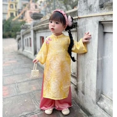 Áo dài bé gái chất gấm thọ cao cấp - Thiết kế Tết 2.026, giá ưu đãi 220.000đ 8 Áo dài bé gái chất gấm thọ cao cấp - Thiết kế Tết 2.026, giá ưu đãi 220.000đ 8