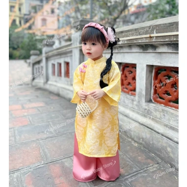Áo dài bé gái chất gấm thọ cao cấp - Thiết kế Tết 2.026, giá ưu đãi 220.000đ 9 Áo dài bé gái chất gấm thọ cao cấp - Thiết kế Tết 2.026, giá ưu đãi 220.000đ 9