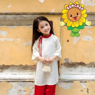 Áo Dài Bé Gái Cổ Tròn Cách Điệu Gấm Hà Đông Nơ Đỏ Size 11‑48kg – 207.500 VNĐ BONCHOP 7 Áo Dài Bé Gái Cổ Tròn Cách Điệu Gấm Hà Đông Nơ Đỏ Size 11‑48kg – 207.500 VNĐ BONCHOP 7