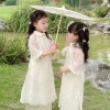 Áo dài bé Sora bébé Thiên An chất liệu tơ siêu nhẹ in nơ xinh đẹp dáng suông cổ sen tay lỡ 1-6 tuổi - Giá ưu đãi 305.000 VND