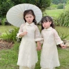 Áo dài bé Sora bébé Thiên An chất liệu tơ siêu nhẹ in nơ xinh đẹp dáng suông cổ sen tay lỡ 1-6 tuổi - Giá ưu đãi 305.000 VND 3