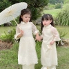 Áo dài bé Sora bébé Thiên An chất liệu tơ siêu nhẹ in nơ xinh đẹp dáng suông cổ sen tay lỡ 1-6 tuổi - Giá ưu đãi 305.000 VND 5