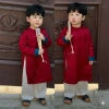 Áo dài cách tân Tết cho bé trai - Thiết kế hiện đại, chất liệu thoáng mát, phong cách trẻ trung, giá chỉ 115.000 VNĐ, khuyến mãi ưu đãi 9