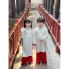 Áo dài mẹ bé gái Tết 2.026 vải gấm thọ dơi mềm mịn đính cúc bọc, giảm giá 229k 3
