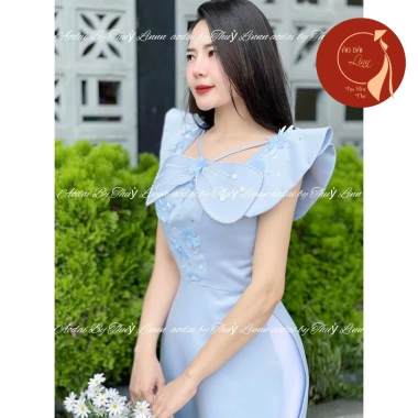 Áo dài nữ tay cánh tiên tafta thêu nổi, cổ vuông phối nơ, điệu đà – 79.000₫ 2