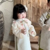 Áo dài Tết bé gái 10-27kg kèm áo gile kim sa Tèn Ten - Giá 700.000₫ 3