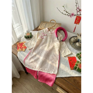 Áo dài tết bé gái cao cấp áo tơ tằm ánh kim cúc tàu + quần lụa mix, kèm bờm tóc - Giá chỉ 179.000₫ 2