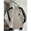 Áo khoác phao nam nữ cổ cao logo thêu cá tính, năng động, dễ phối outfit 169.750₫ 9