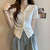 Áo kiểu cổ bẻ chữ V nhúm ngực, vạt chéo đính 4 cúc - Giá chỉ 105.020₫ 7