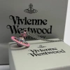 Áo len dài vintage Vivienne Westwood họa tiết hồng và vòng cổ nơ 3D sao Thổ 4