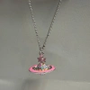 Áo len dài vintage Vivienne Westwood họa tiết hồng và vòng cổ nơ 3D sao Thổ 5