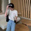 Áo len ngắn tay cổ tròn logo trái tim phong cách Hàn Quốc Giá chỉ 152.220₫ 10