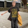 Áo phông nữ form rộng vintage RTOML, chữ cái và hình cỏ tròn, 100% cotton, giảm giá 69k 2