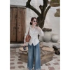 Áo sơ mi dài tay vạt chéo cài cúc style Hàn, họa tiết kẻ URO - Giá chỉ 155.000₫ 3