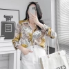 Áo sơ mi lụa nữ họa tiết tờ báo xanh vàng dài tay - Giá chỉ 185.000 VND 5