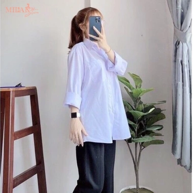 Áo sơ mi nữ tay dài học sinh form rộng basic trắng cổ V bẻ trụ cotton lanh không túi 82.999₫ 2
