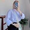 Áo sơ mi nữ tay dài học sinh form rộng basic trắng cổ V bẻ trụ cotton lanh không túi 82.999₫ 6