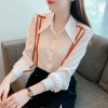 Áo sơ mi tay dài dáng rộng kẻ sọc thời trang công sở Hàn Quốc nữ - 311.943₫ 2