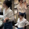 Áo sơ mi trắng dài tay thêu ngựa dáng basic Giá chỉ 285.000đ giảm tới 21%