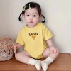 Áo thun Nhà Đăng màu vàng smile trái tim cotton 100% co giãn 4C in bền 123.000₫ 3
