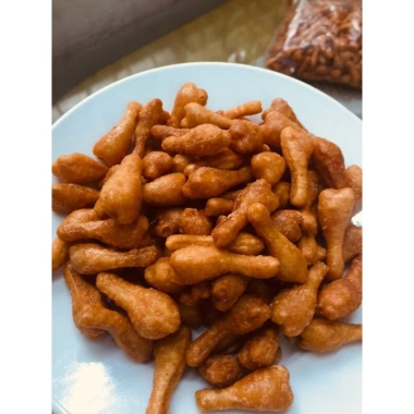 Bim Bim Đùi Gà Cay Mặn Ngọt 1kg - Snack Giòn Tan, Vị Đậm Đà, Giá Ưu Đãi 53.000đ